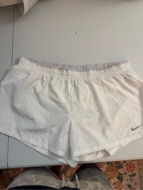 Nike Women's White Athletic Mesh Running Shorts with Swoosh